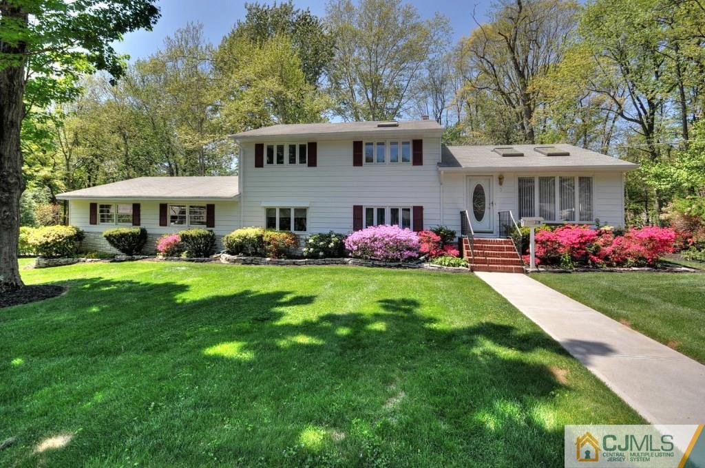 5 Timber Road East Brunswick, NJ 08816 - Photo 2 of 25 a view of an house with garden and trees