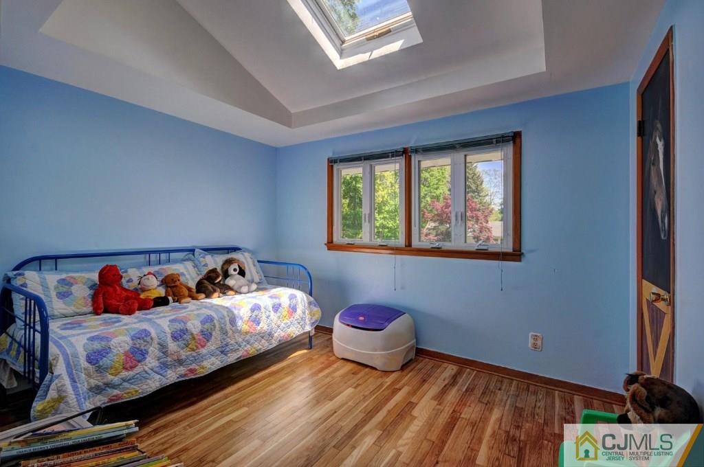 5 Timber Road East Brunswick, NJ 08816 - Photo 11 of 25 a bedroom with bed and a window