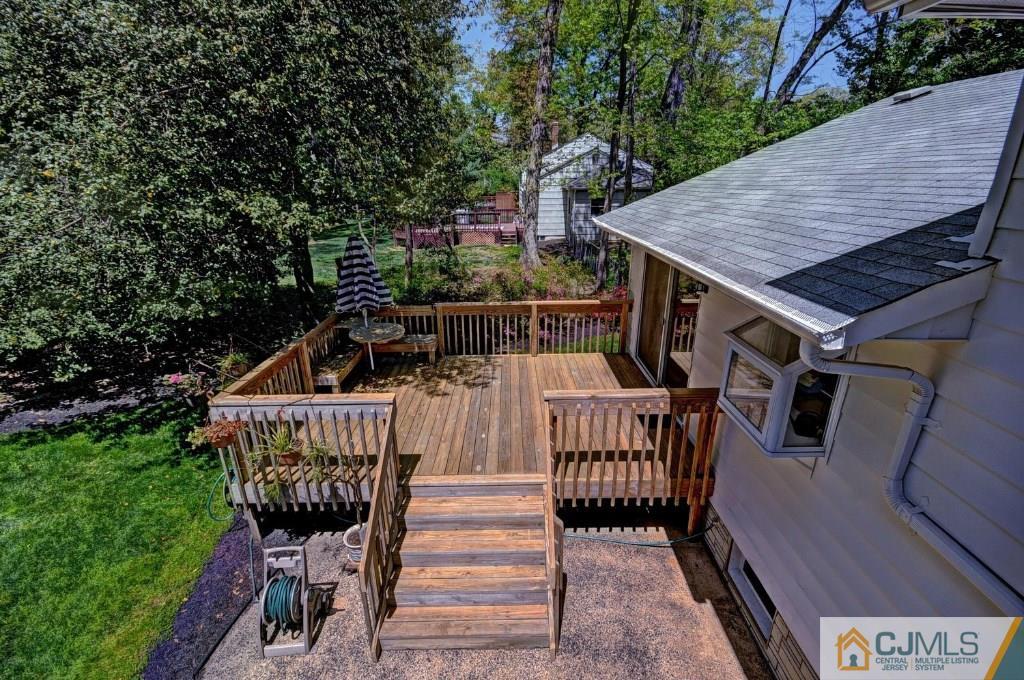 5 Timber Road East Brunswick, NJ 08816 - Photo 19 of 25 a view of balcony with wooden floor and outdoor seating