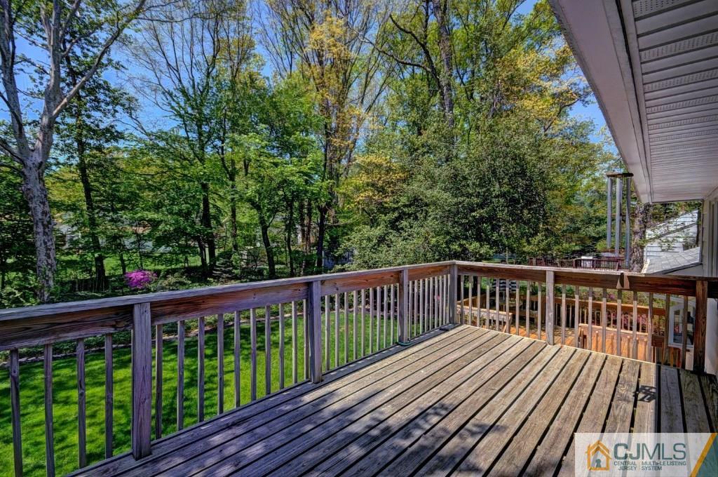 5 Timber Road East Brunswick, NJ 08816 - Photo 22 of 25 a view of balcony with wooden floor and fence