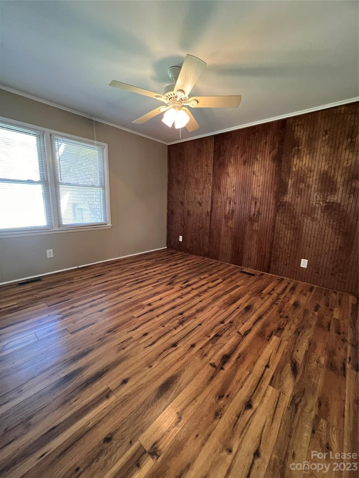 2213 Acme Road Belmont, NC 28012 - Photo 4 of 8 wooden floor in an empty room with a window
