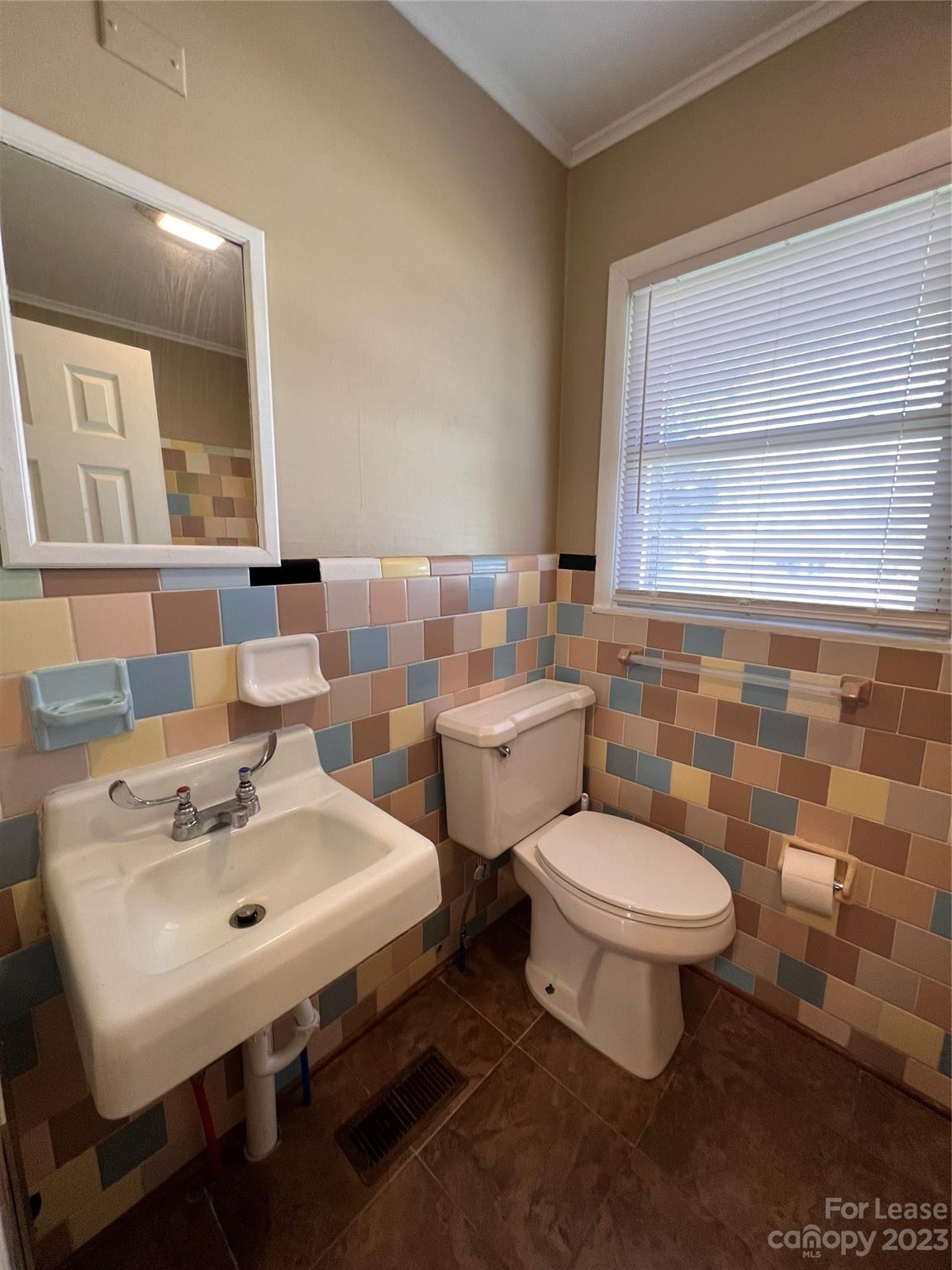 2213 Acme Road Belmont, NC 28012 - Photo 7 of 8 a bathroom with a sink a toilet and mirror