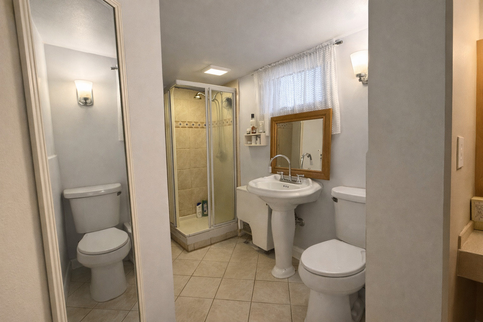 128 North York Road Bensenville, IL 60106 - Photo 13 of 19 a bathroom with a sink toilet and shower