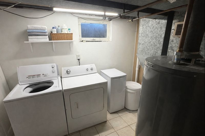 128 North York Road Bensenville, IL 60106 - Photo 14 of 19 a utility room with dryer and washer