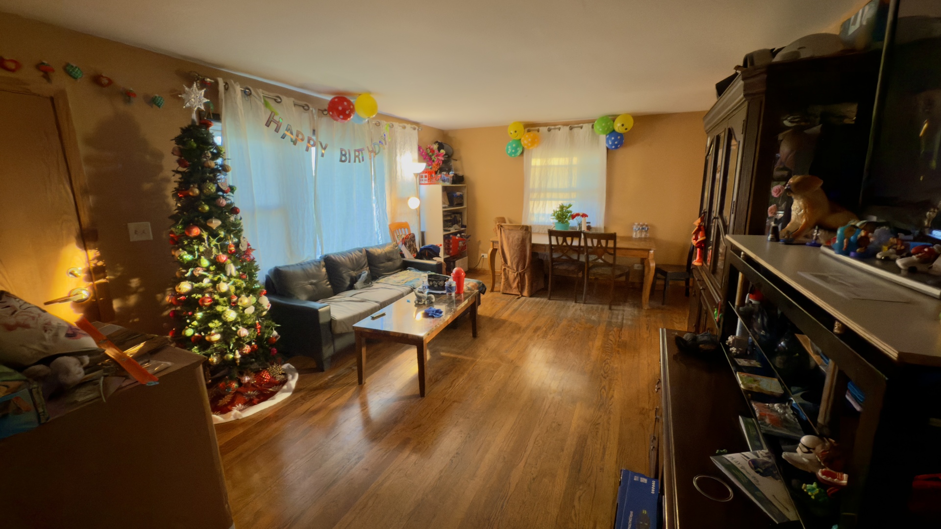 128 North York Road Bensenville, IL 60106 - Photo 5 of 19 a living room with furniture and a flat screen tv