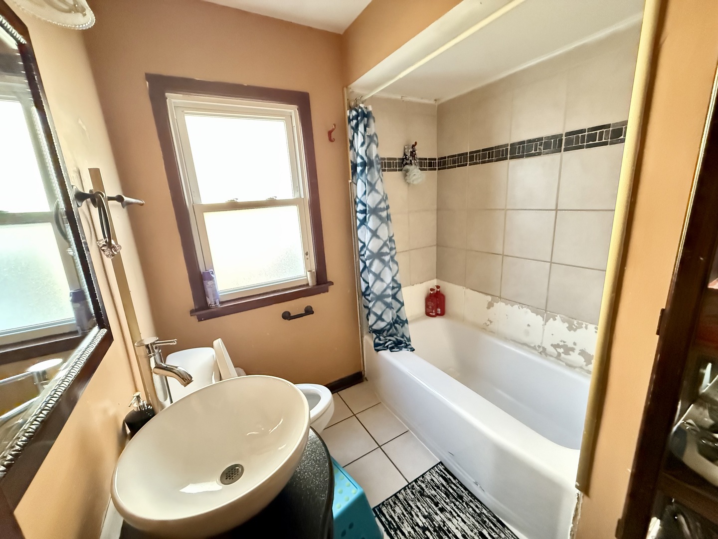 128 North York Road Bensenville, IL 60106 - Photo 9 of 19 a bathroom with a sink toilet and shower