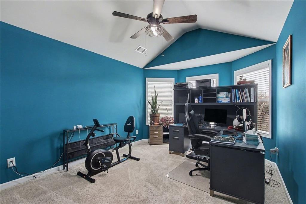 3499 In Bloom Way Auburn, GA 30011 - Photo 27 of 30 a view of a workspace with furniture
