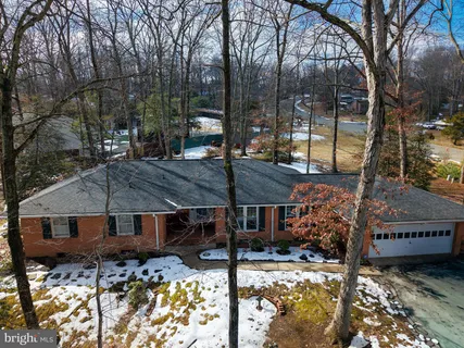 a view of house with yard