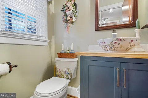 a bathroom with a toilet and a sink