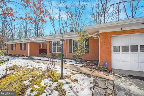 a view of a house with a street