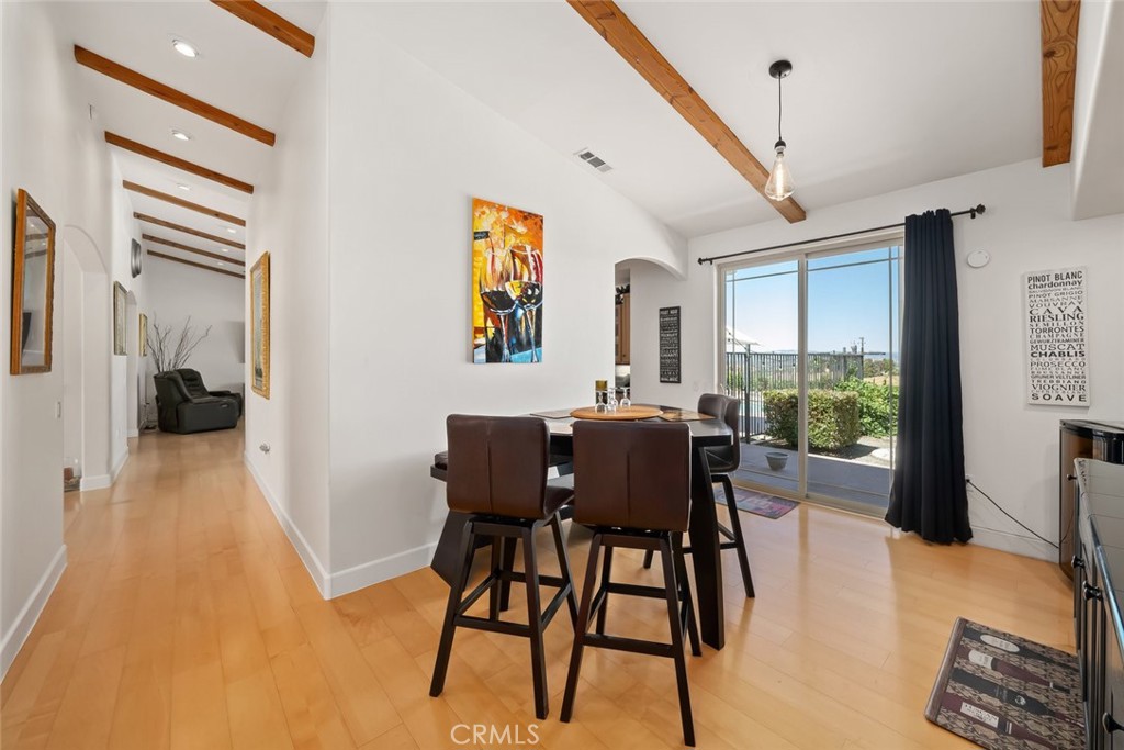 6172 Hawk Ridge Place San Miguel, CA 93451 - Photo 28 of 74 a view of a dining room with furniture window and wooden floor