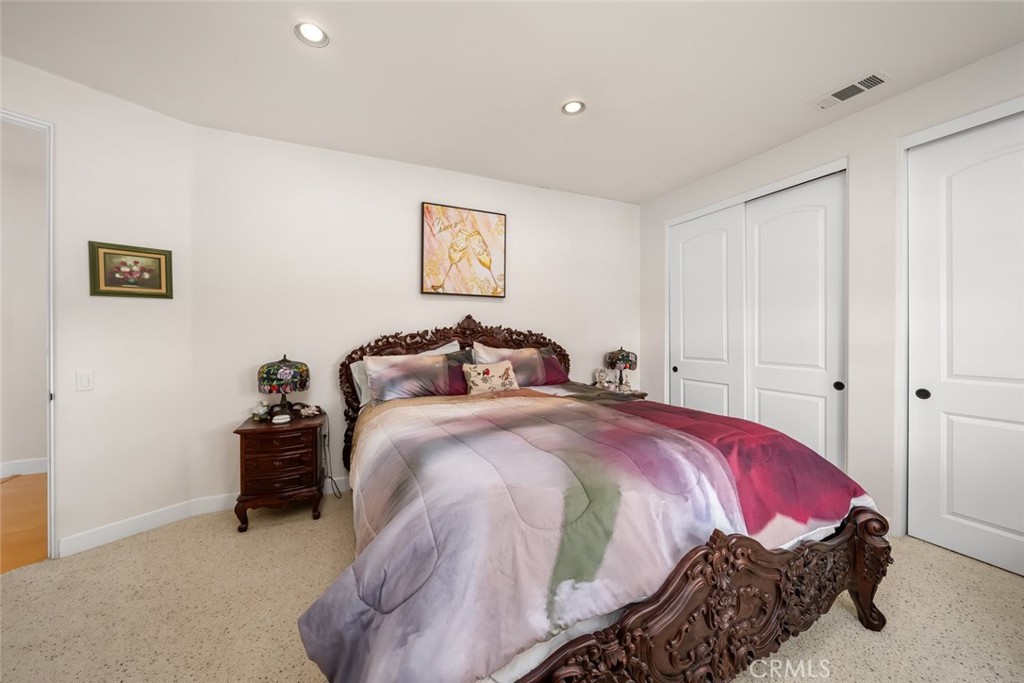 6172 Hawk Ridge Place San Miguel, CA 93451 - Photo 42 of 74 a bedroom with a bed and a lamp