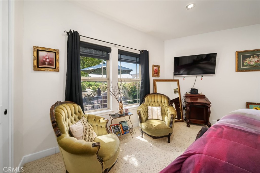 6172 Hawk Ridge Place San Miguel, CA 93451 - Photo 43 of 74 a bedroom with furniture and a flat screen tv