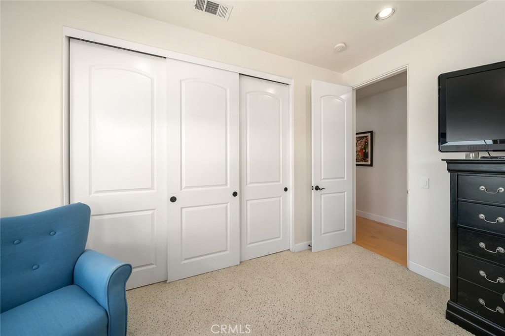 6172 Hawk Ridge Place San Miguel, CA 93451 - Photo 46 of 74 a living room with furniture and a flat screen tv