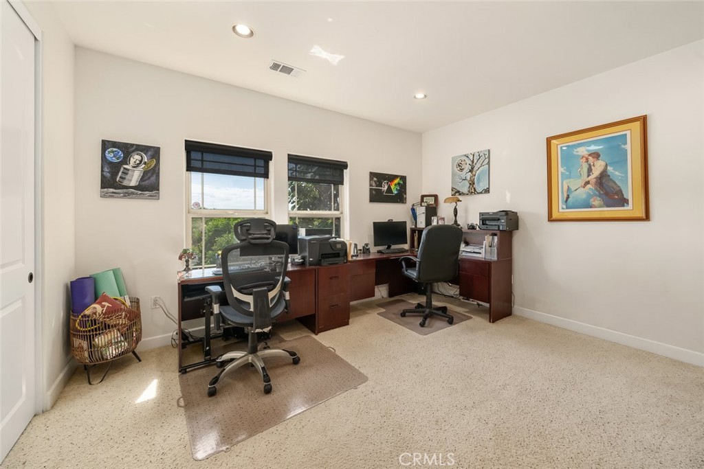 6172 Hawk Ridge Place San Miguel, CA 93451 - Photo 49 of 74 a view of a workspace with furniture and a window
