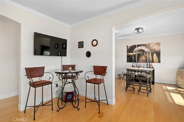 a view of a livingroom with furniture and a flat screen tv