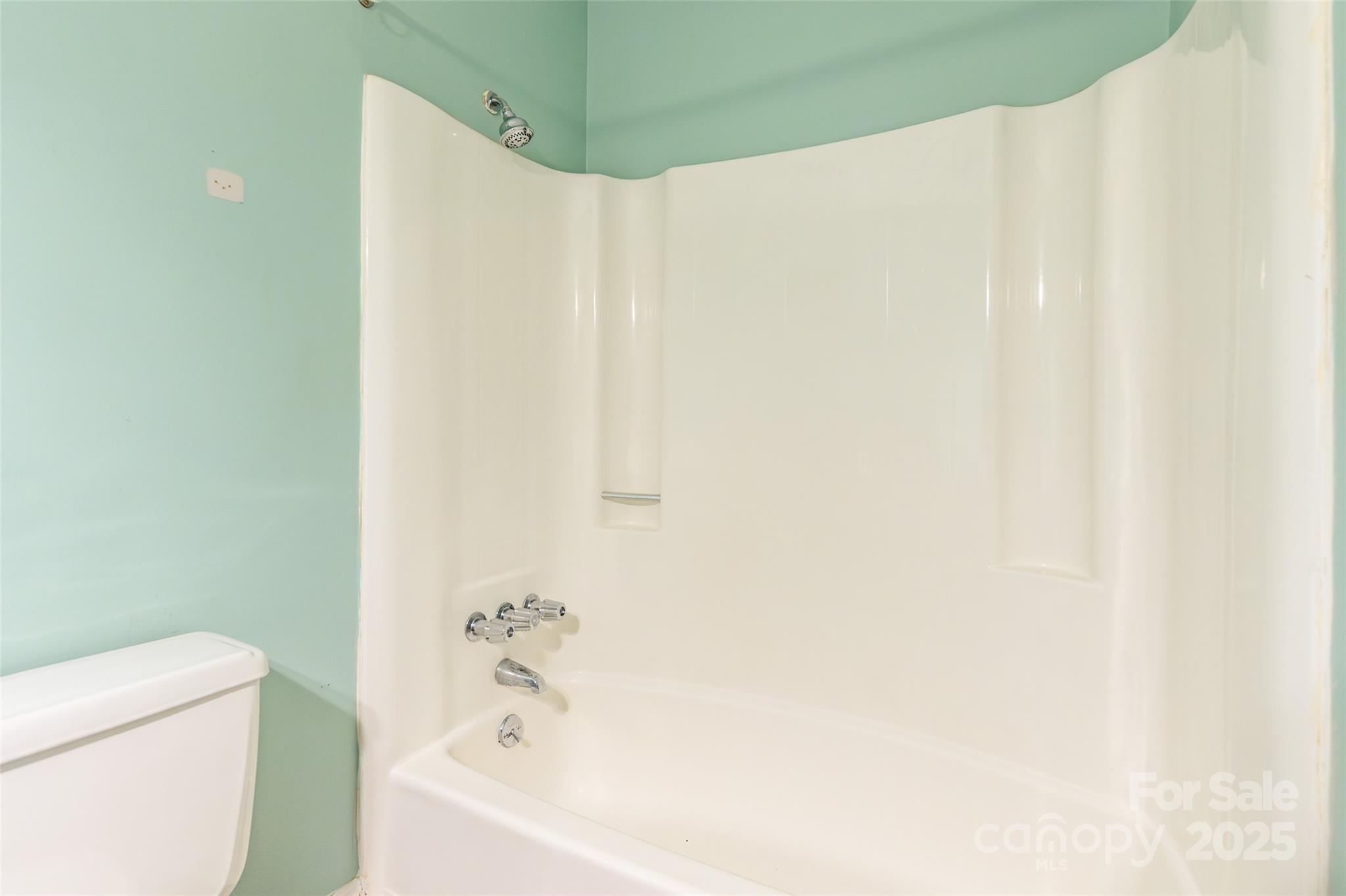 1806 Ebenezer Road, Unit E Rock Hill, SC 29732 - Photo 15 of 23 a bathroom with a white bathtub
