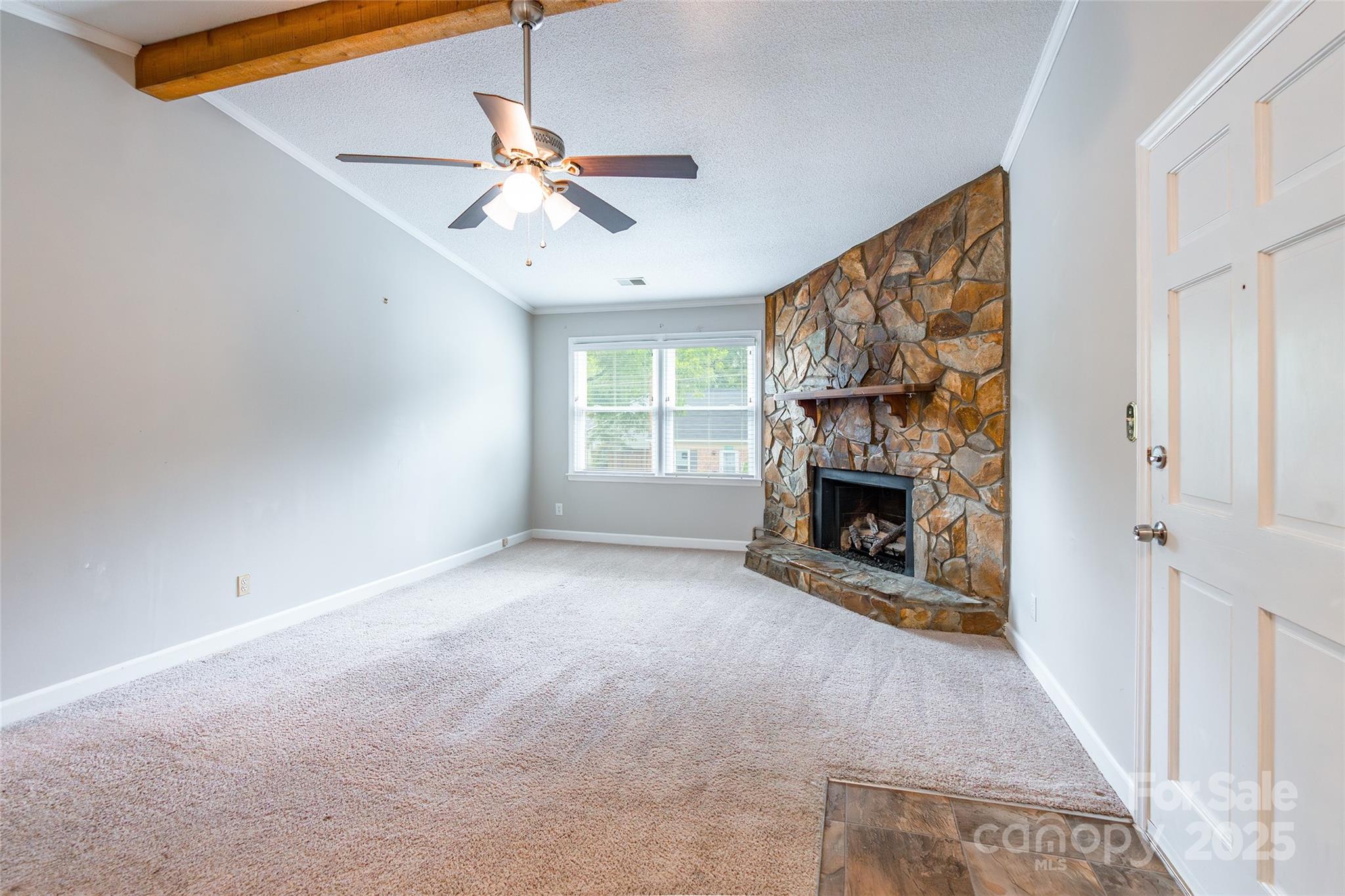 1806 Ebenezer Road, Unit E Rock Hill, SC 29732 - Photo 4 of 23 a view of a livingroom with a fireplace and window