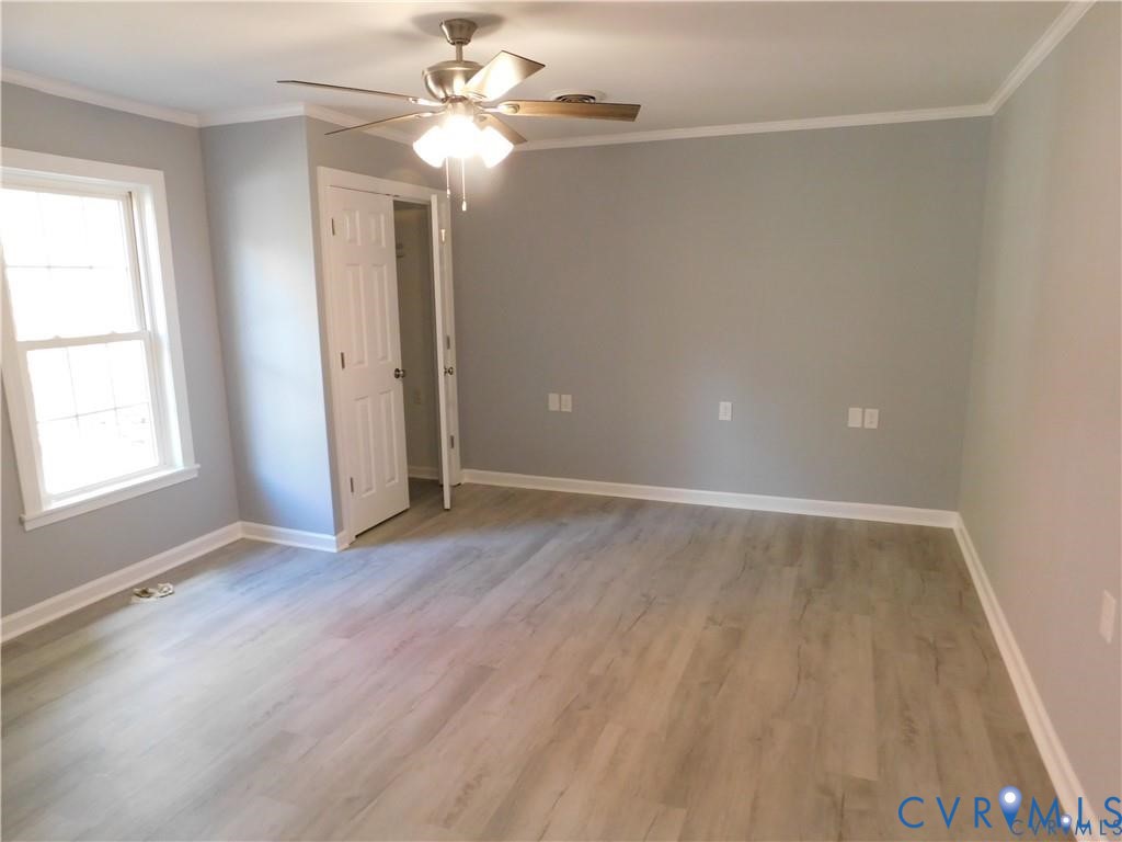 1947 Crewsville Road Bumpass, VA 23024 - Photo 14 of 32 Ceiling fan new LVP flooring