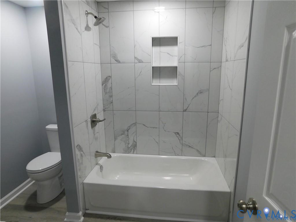 1947 Crewsville Road Bumpass, VA 23024 - Photo 21 of 32 New tub with ceramic tile surround