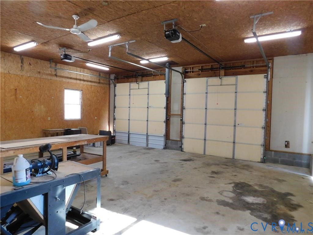 1947 Crewsville Road Bumpass, VA 23024 - Photo 25 of 32 Garage with over sized doors