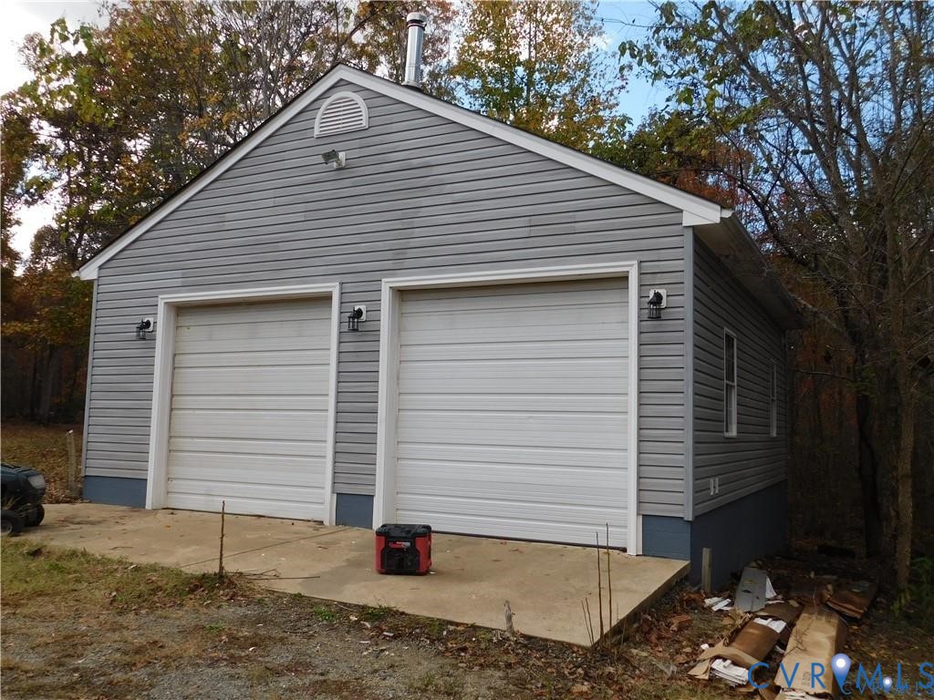 1947 Crewsville Road Bumpass, VA 23024 - Photo 3 of 32 30x30 garage with 11.5 foot ceilings