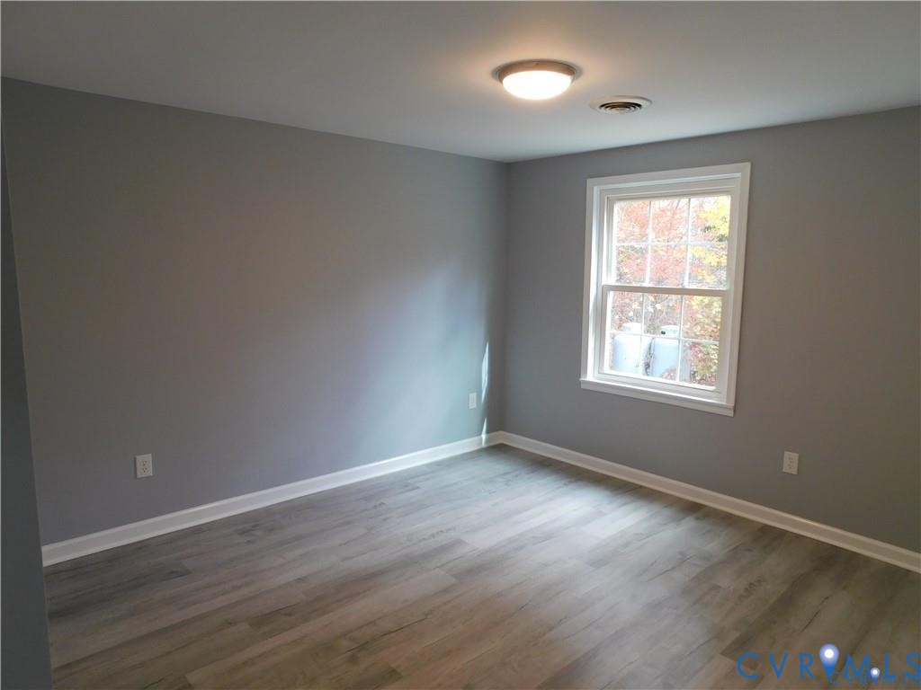 1947 Crewsville Road Bumpass, VA 23024 - Photo 31 of 32 3rd bedroom new LVP Flooring