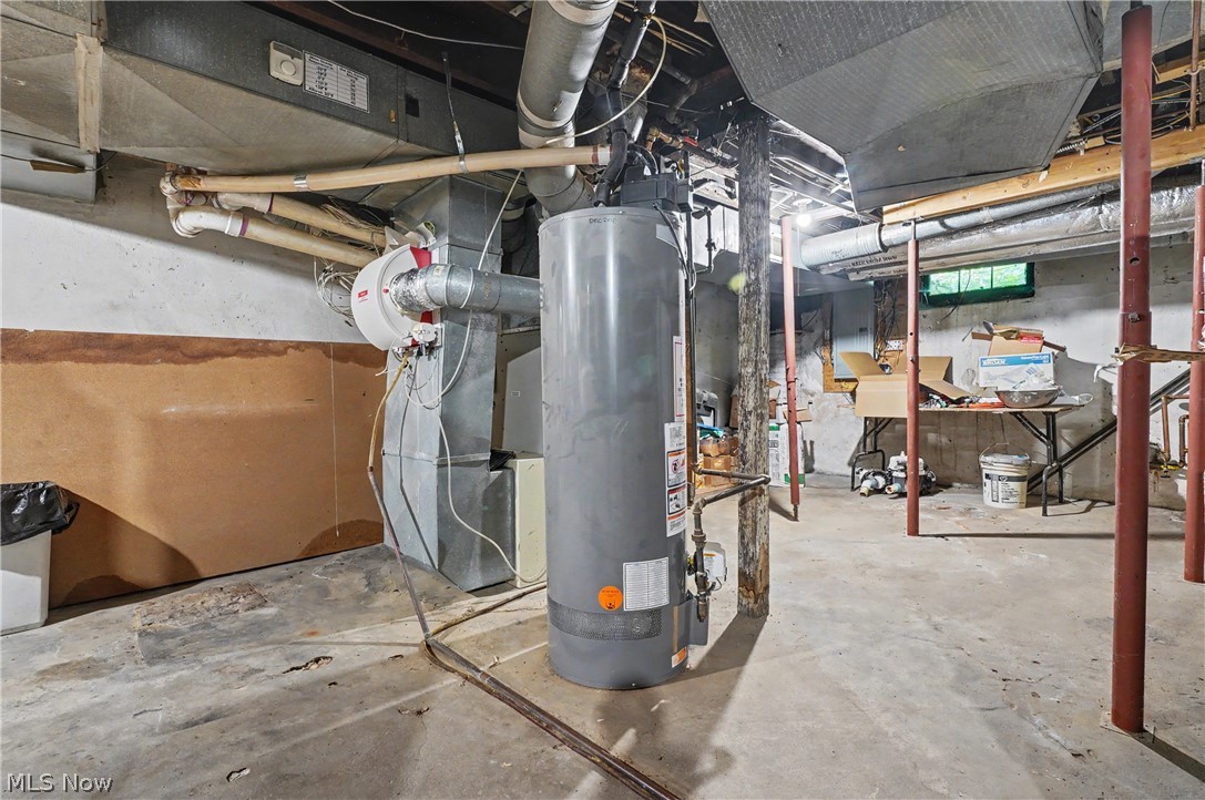 543 Fouse Avenue Akron, OH 44310 - Photo 50 of 50 Another partial view of the walk-out basement and furnace and hot water tank.