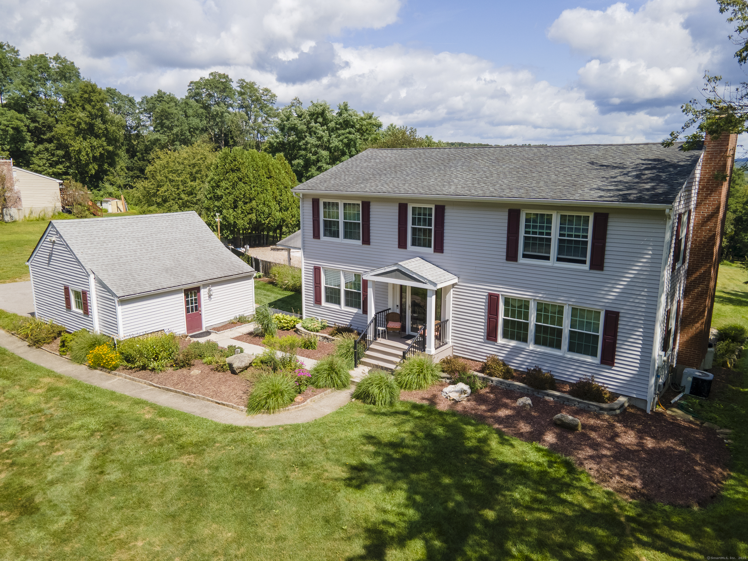 front view of a house with a yard