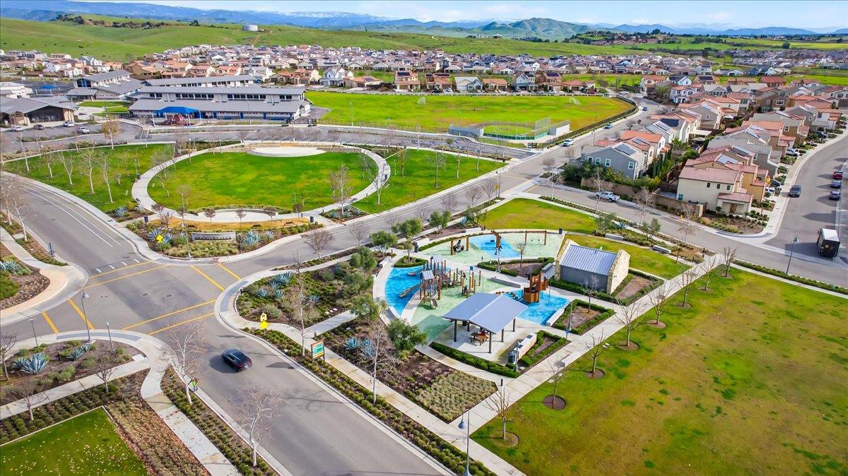 4593 Orchard Hills Road Madera, CA 93636 - Photo 23 of 25 an aerial view of a swimming pool with outdoor seating and yard