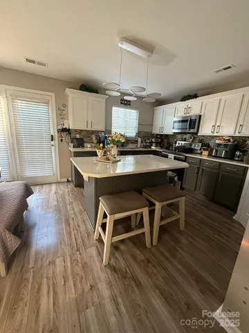 a view of balcony with patio