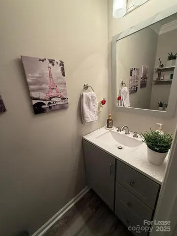 a bathroom with a toilet and a sink