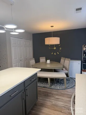 a view of a swimming pool with a sitting area