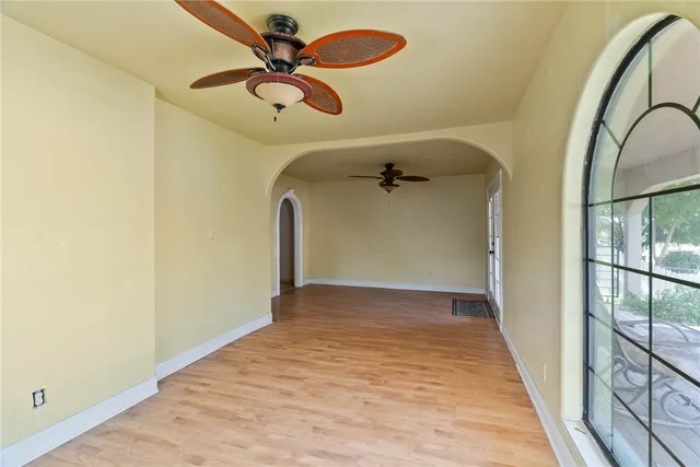 a view of a hallway with a chandelier