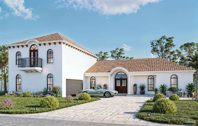 a front view of a house with garden