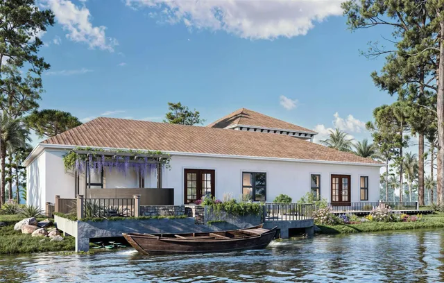 a front view of a house with swimming pool and lake view