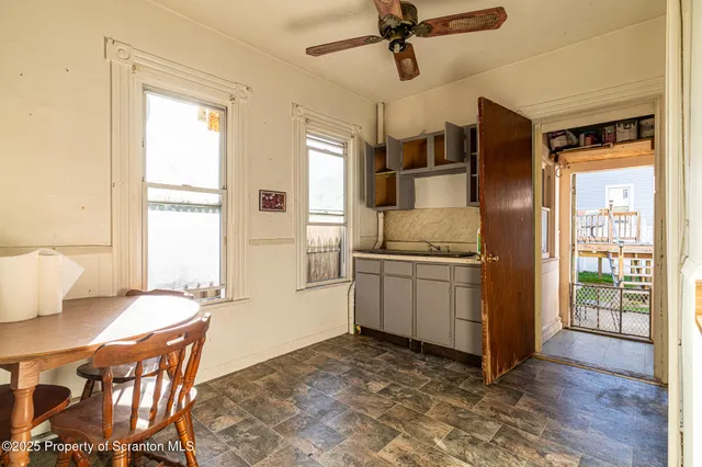 a bathroom with a shower toilet and a shower