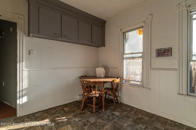 a kitchen with a stove and a refrigerator
