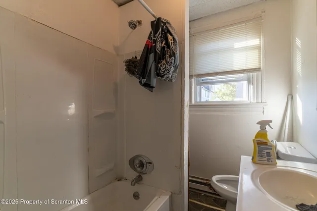 a room with furniture and a window