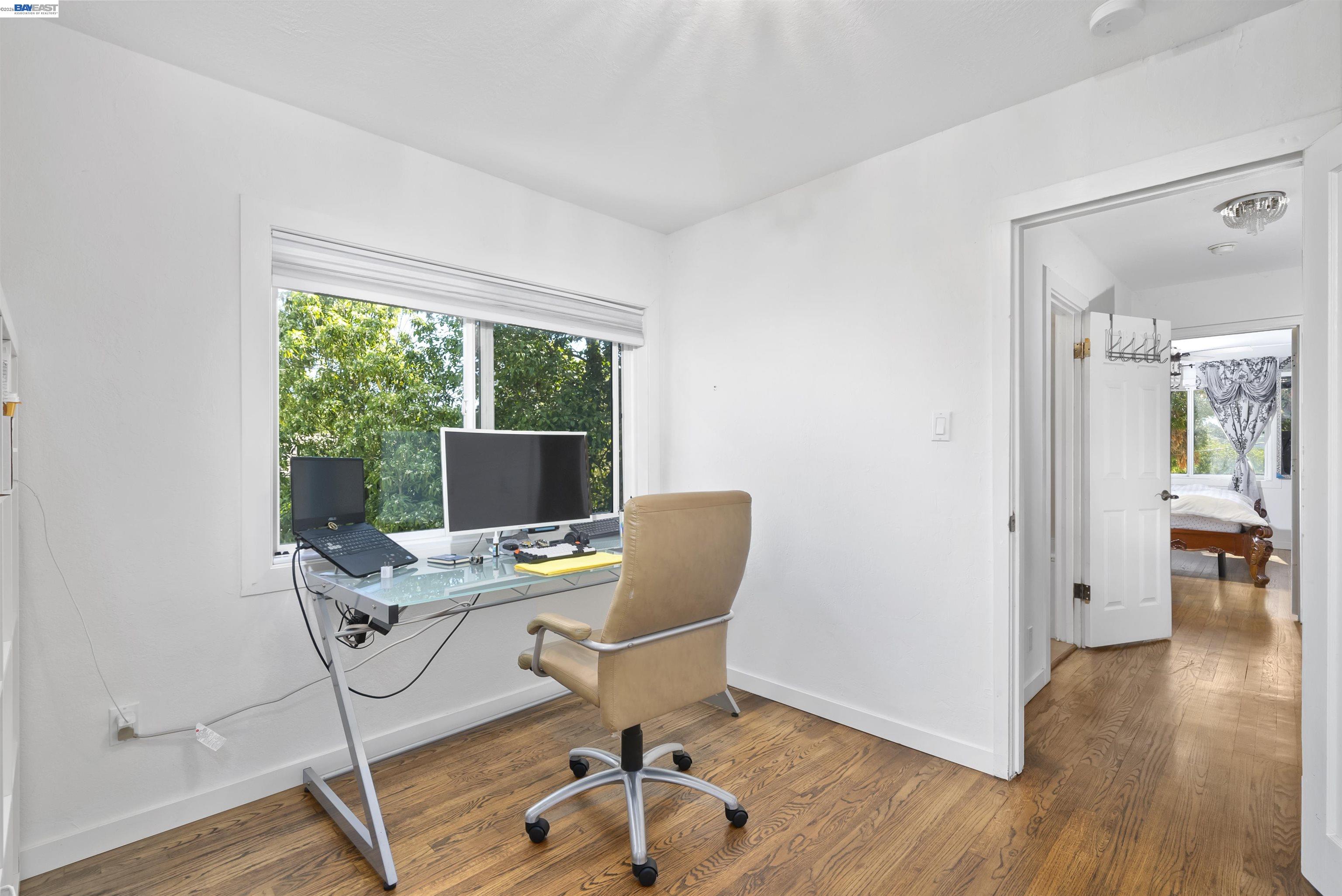 24849 2nd Street Hayward, CA 94541 - Photo 21 of 24 a workspace with wooden floor and a window