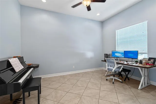 a spacious bedroom with a bed and a window