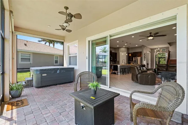 a view of a house with a yard and a porch
