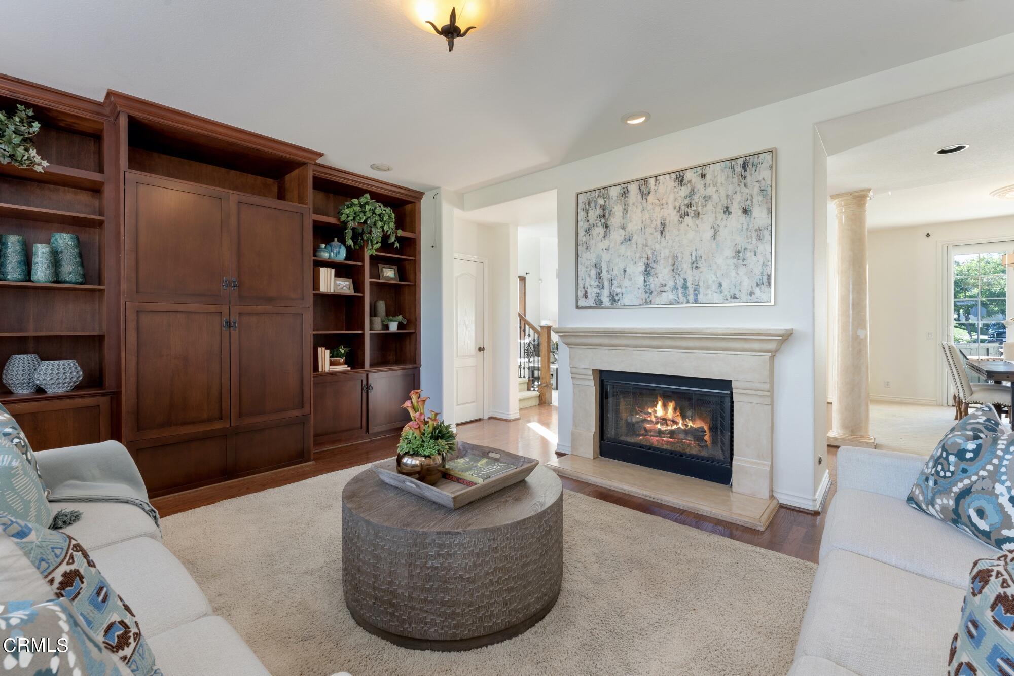 3658 Giddings Ranch Road Altadena, CA 91001 - Photo 14 of 53 a living room with furniture and a fireplace