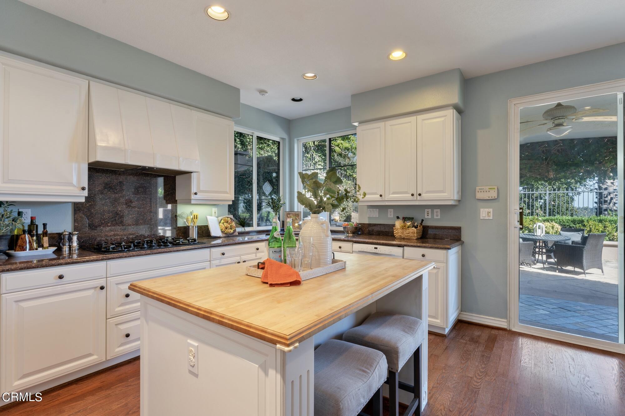 3658 Giddings Ranch Road Altadena, CA 91001 - Photo 20 of 53 a kitchen with a stove a sink and a refrigerator