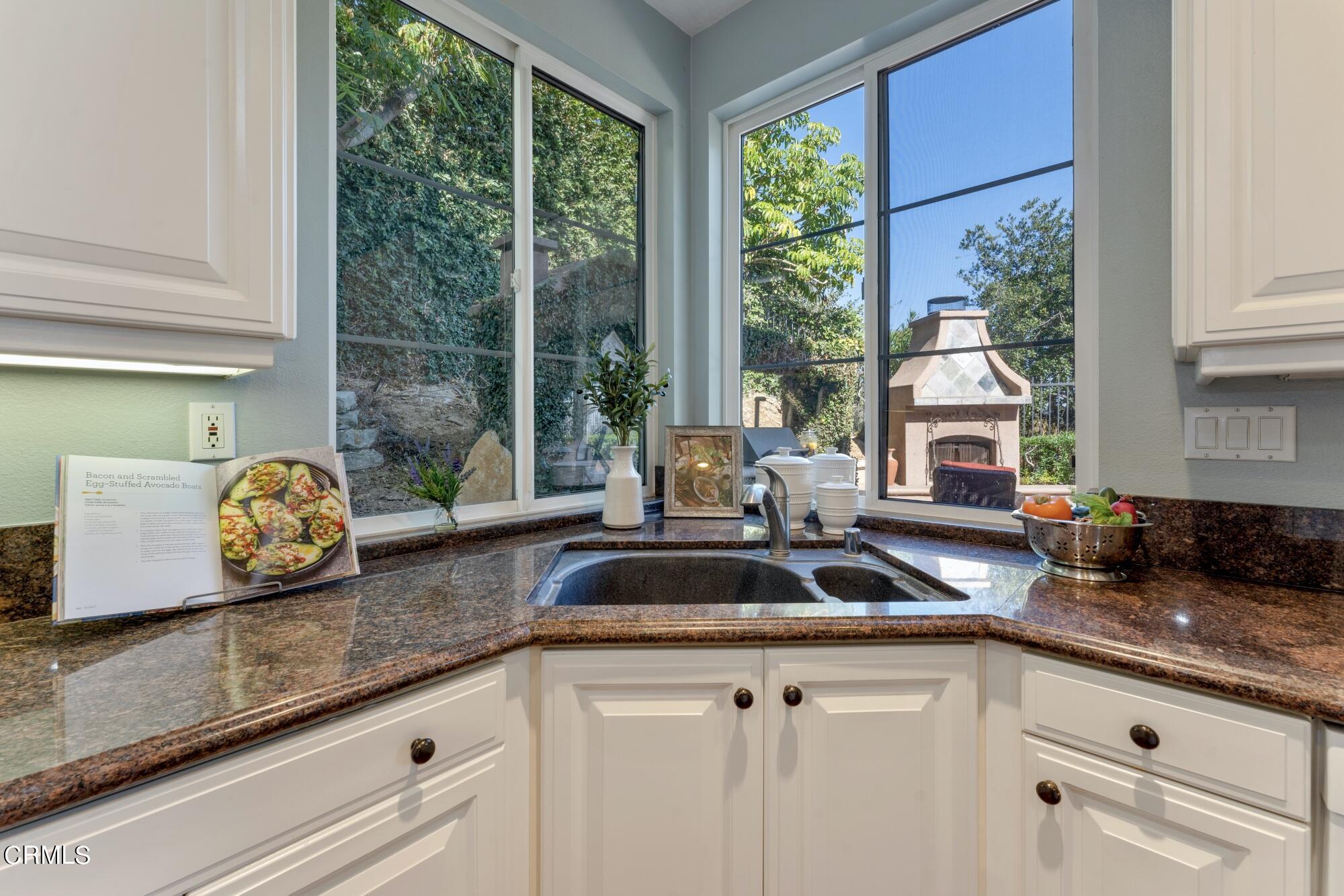 3658 Giddings Ranch Road Altadena, CA 91001 - Photo 22 of 53 a kitchen with granite countertop a sink and a window