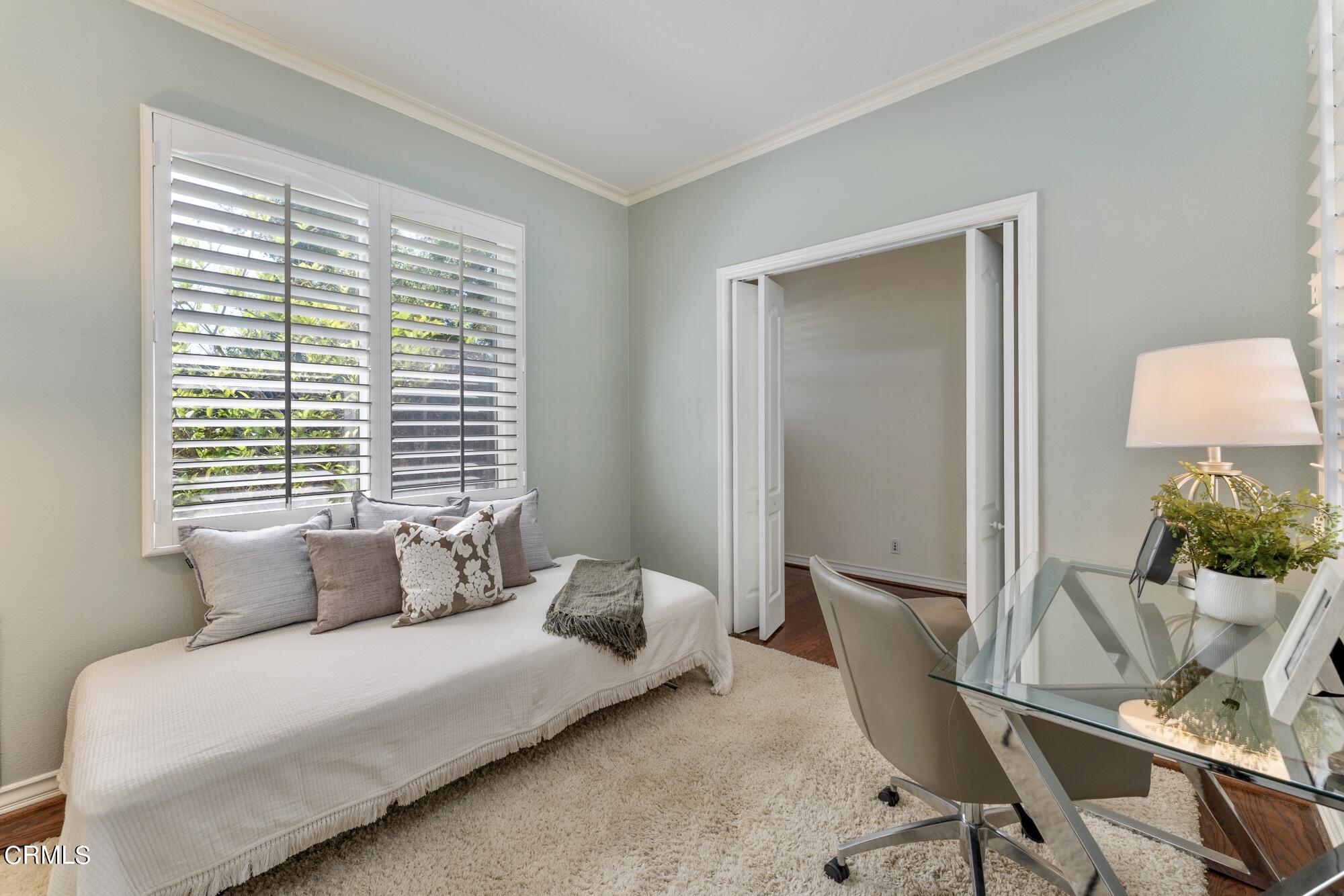 3658 Giddings Ranch Road Altadena, CA 91001 - Photo 25 of 53 a bedroom with a bed and wooden floor