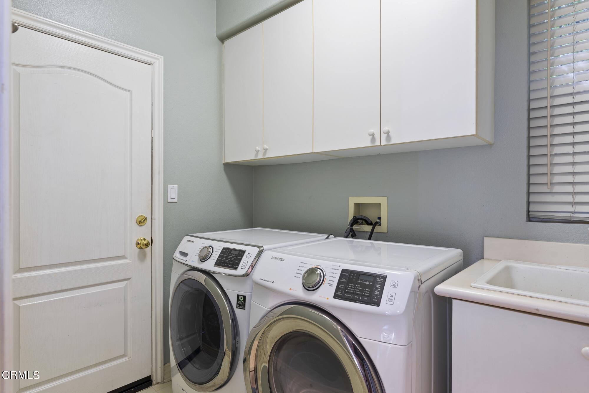 3658 Giddings Ranch Road Altadena, CA 91001 - Photo 27 of 53 a utility room with dryer and washer