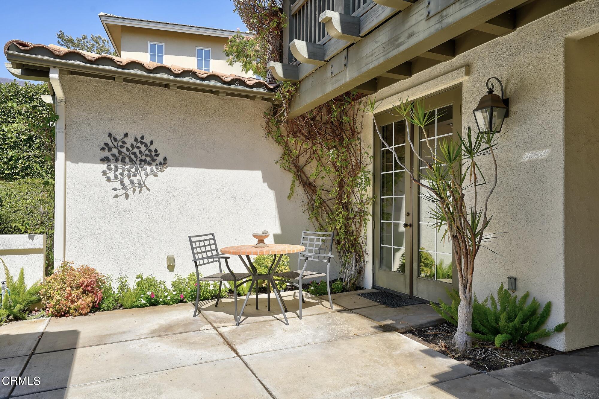 3658 Giddings Ranch Road Altadena, CA 91001 - Photo 4 of 53 a view of a patio with table and chairs and potted plants