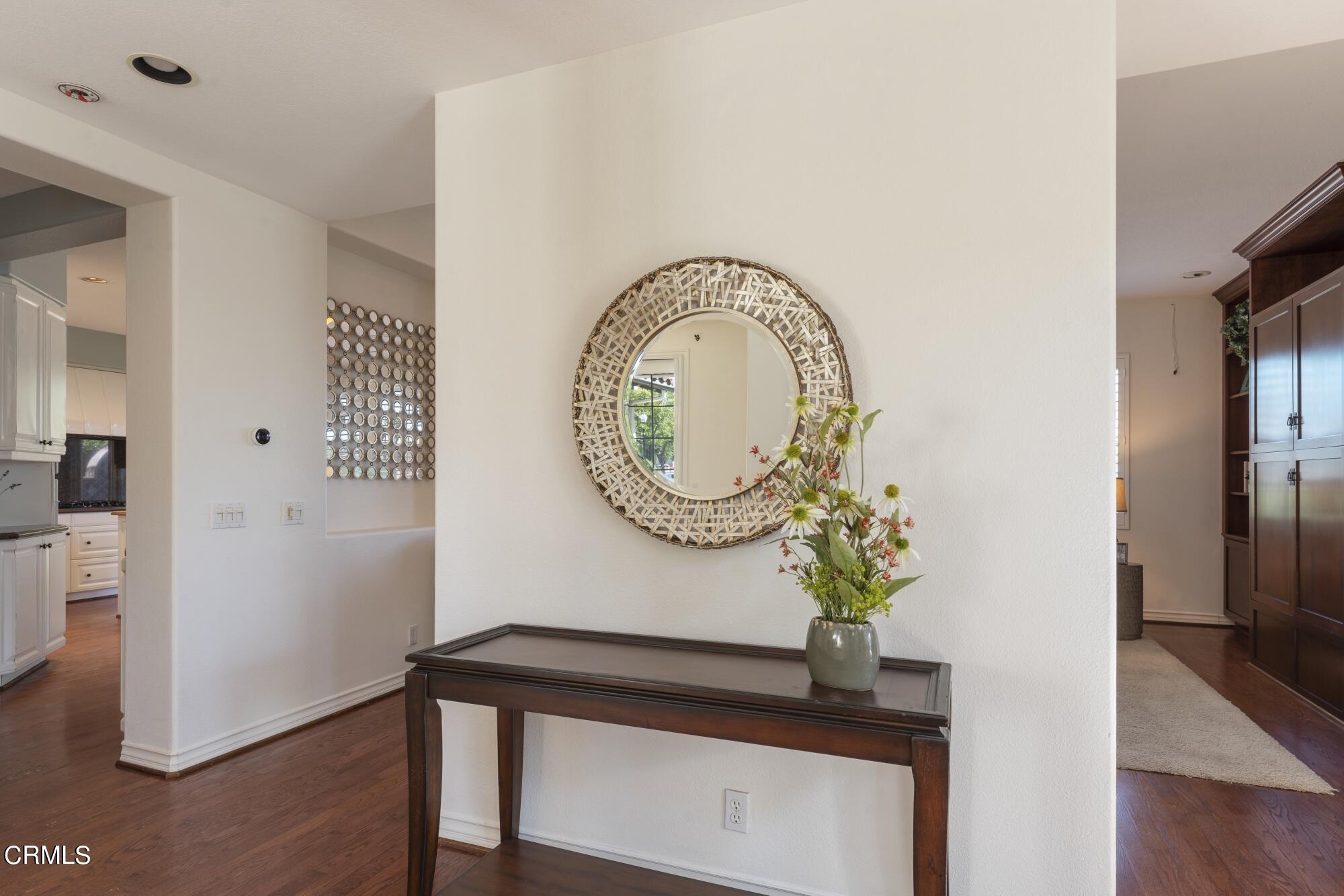 3658 Giddings Ranch Road Altadena, CA 91001 - Photo 7 of 53 a view of a hallway with entryway wooden floor and front door