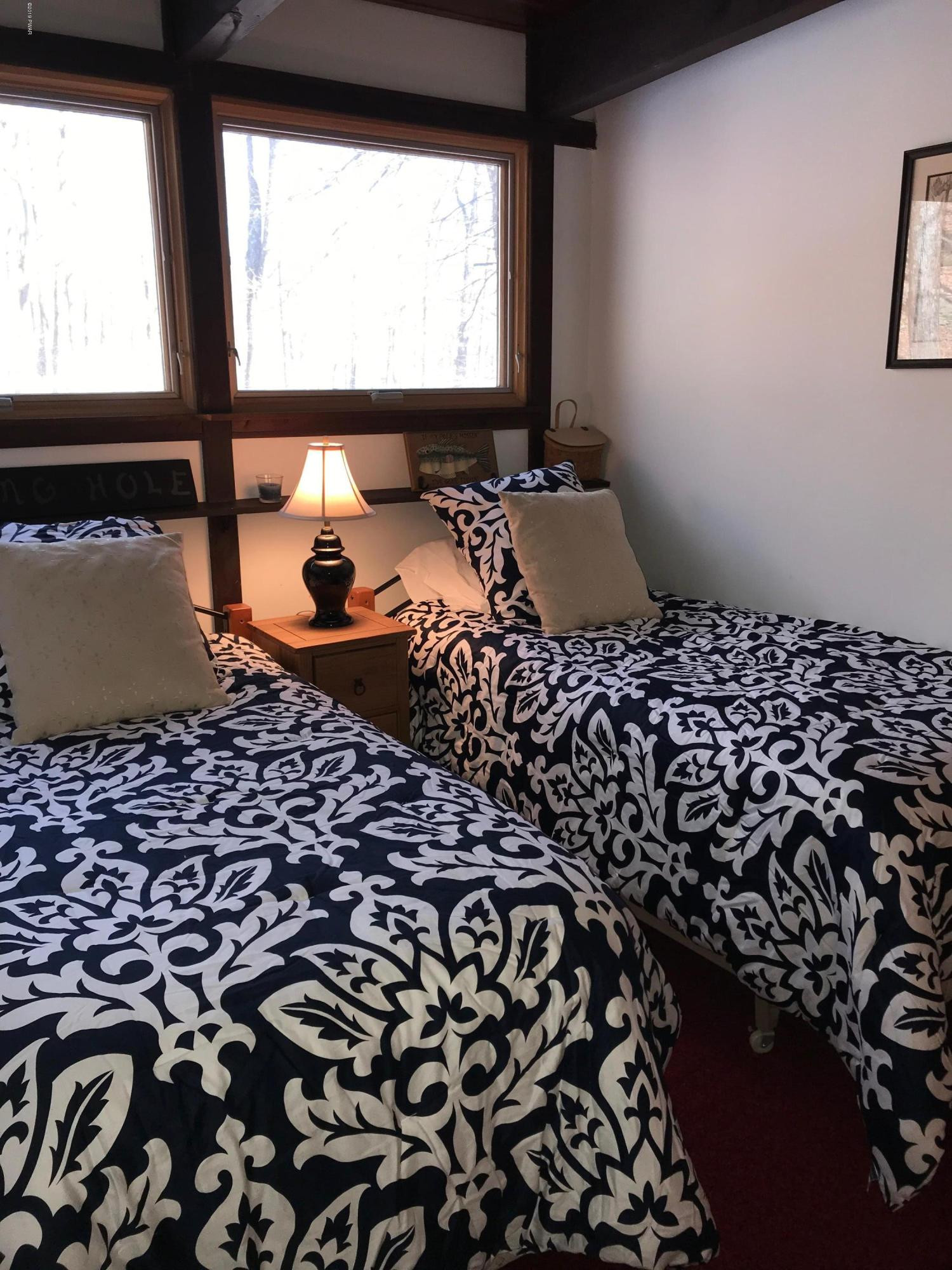 819 Wargo Road Union Dale, PA 18470 - Photo 28 of 49 a room with a bed and a window